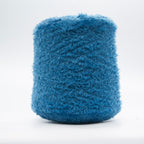 Cone of Tagliatino Merino yarn in Blu Zaffiro by Filati Venezia