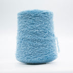 Cone of Tagliatino Merino yarn in Melograno Rosso by Filati Venezia