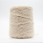 Cone of Tagliatino Merino yarn in Panna Fresca by Filati Venezia