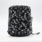 Cone of Tagliatino Merino yarn in Stracciatella by Filati Venezia