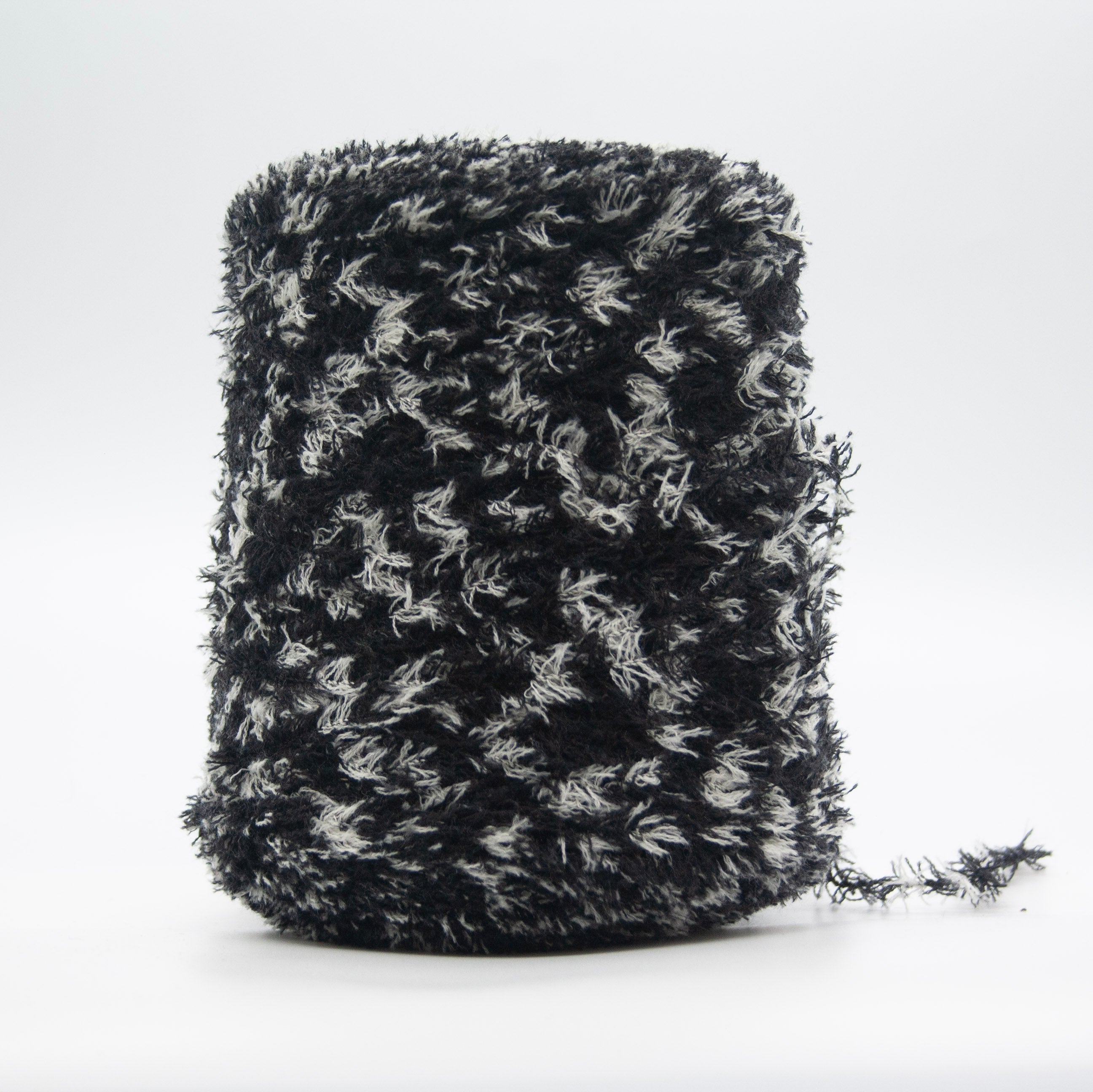 Cone of Tagliatino Merino yarn in Stracciatella by Filati Venezia