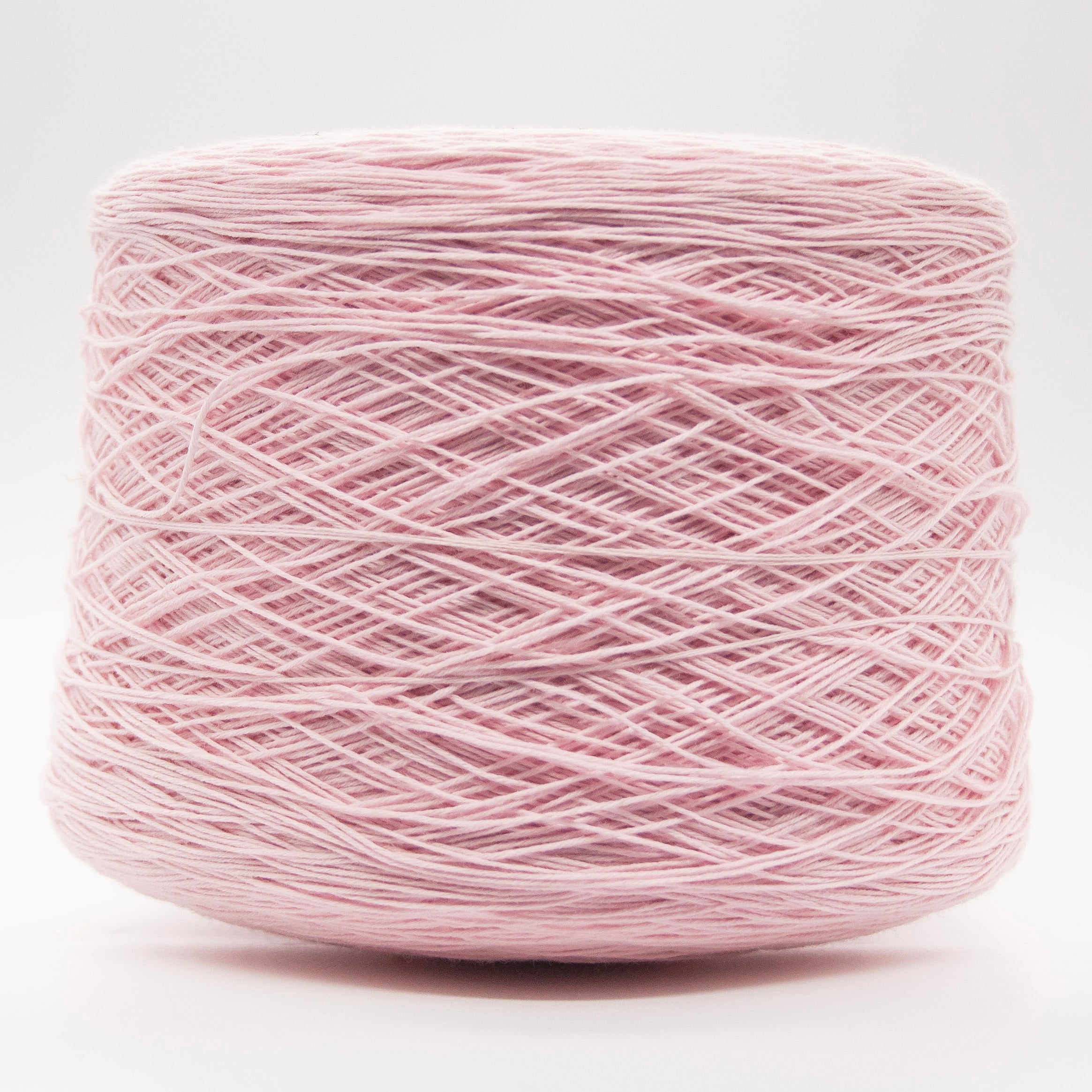 Cone of Victoria Merino yarn in Rosa Cipria by Filati Venezia