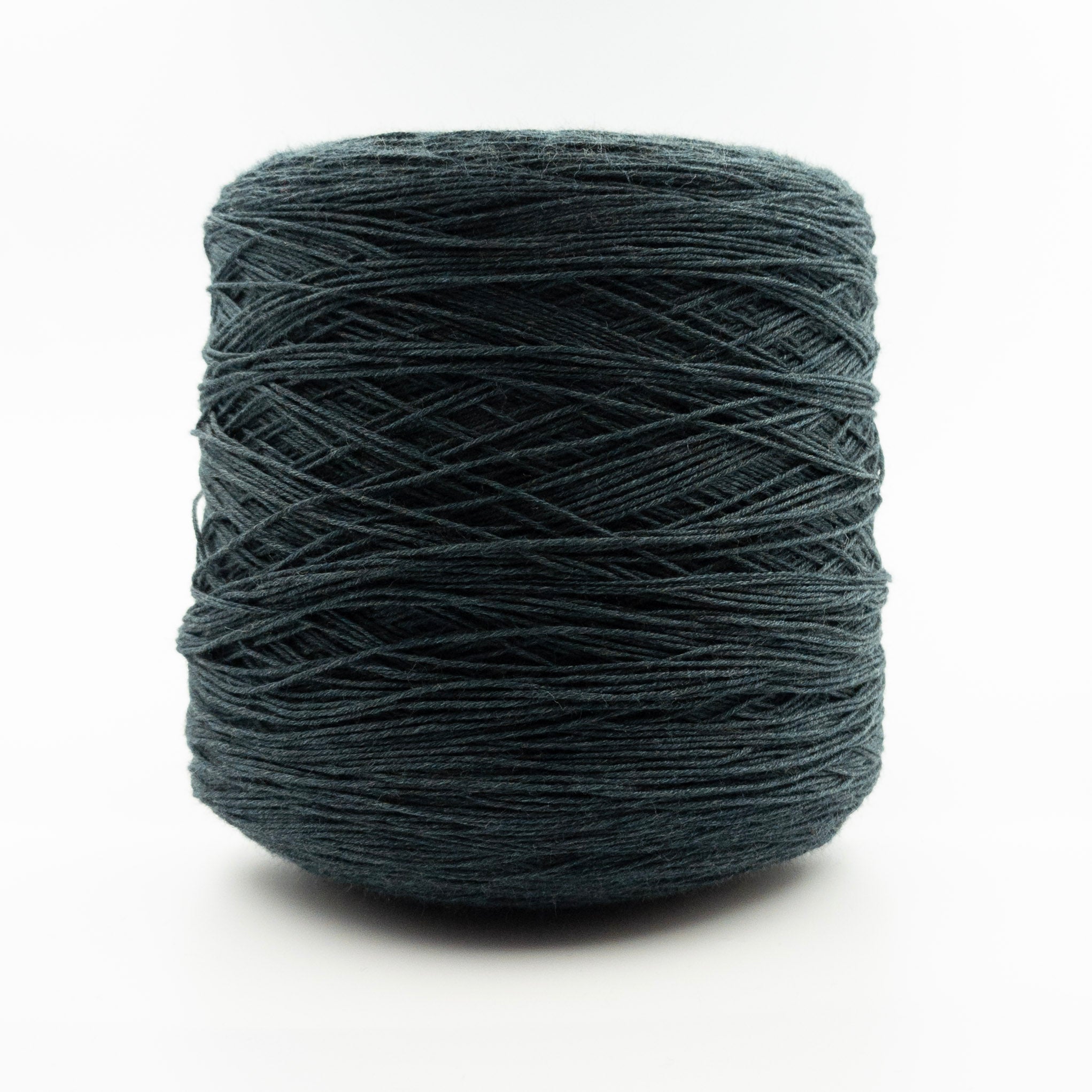 Cone of Victoria Merino yarn in Verde Sc by Filati Venezia