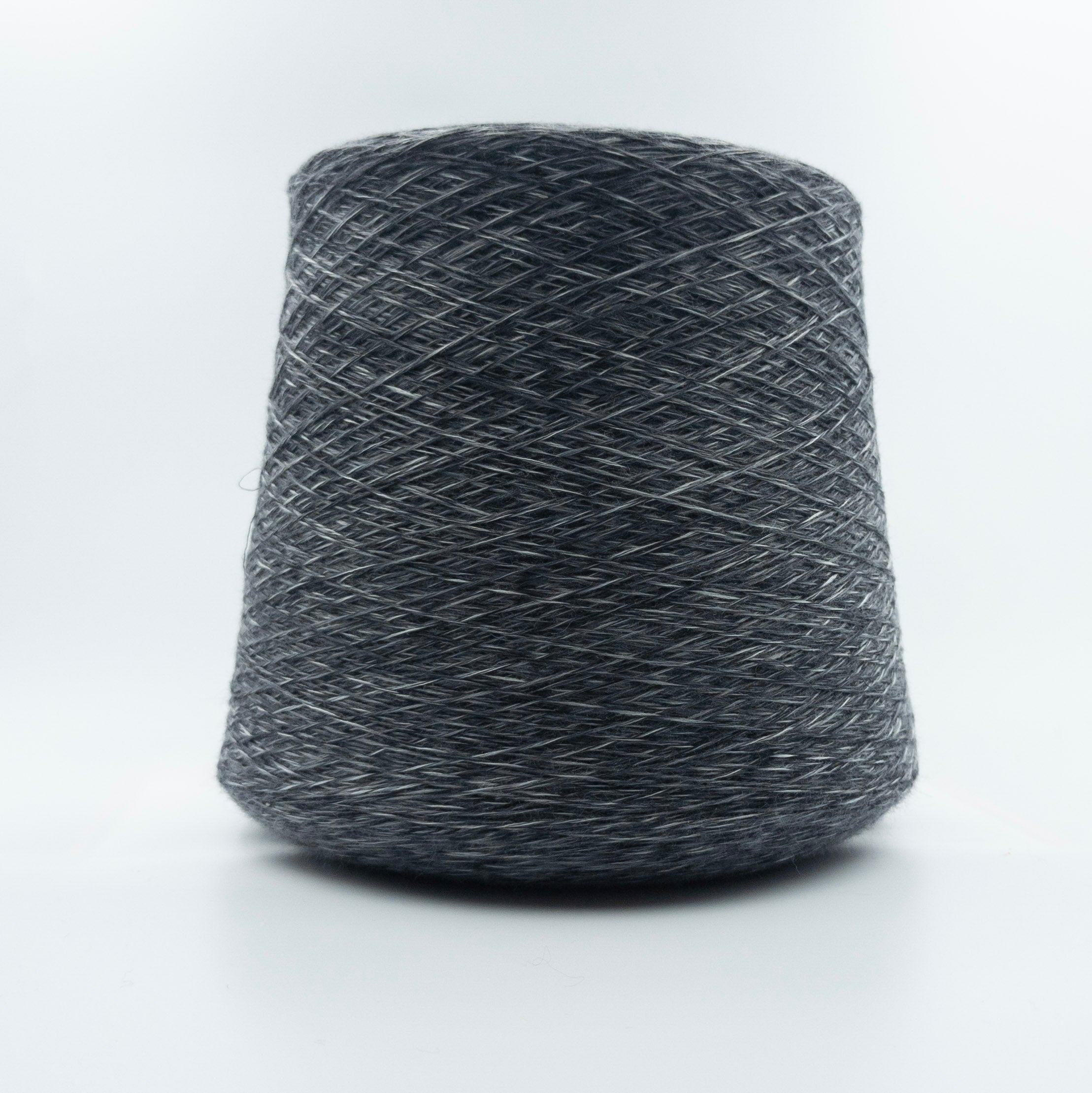 Cone of Wallardo yarn in Graphite Marl by Suedwolle Group